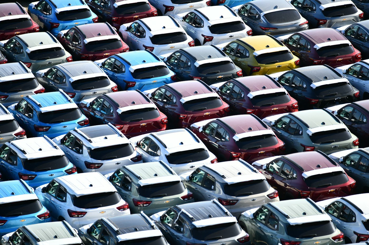 Rows of cars in a large vehicle yard