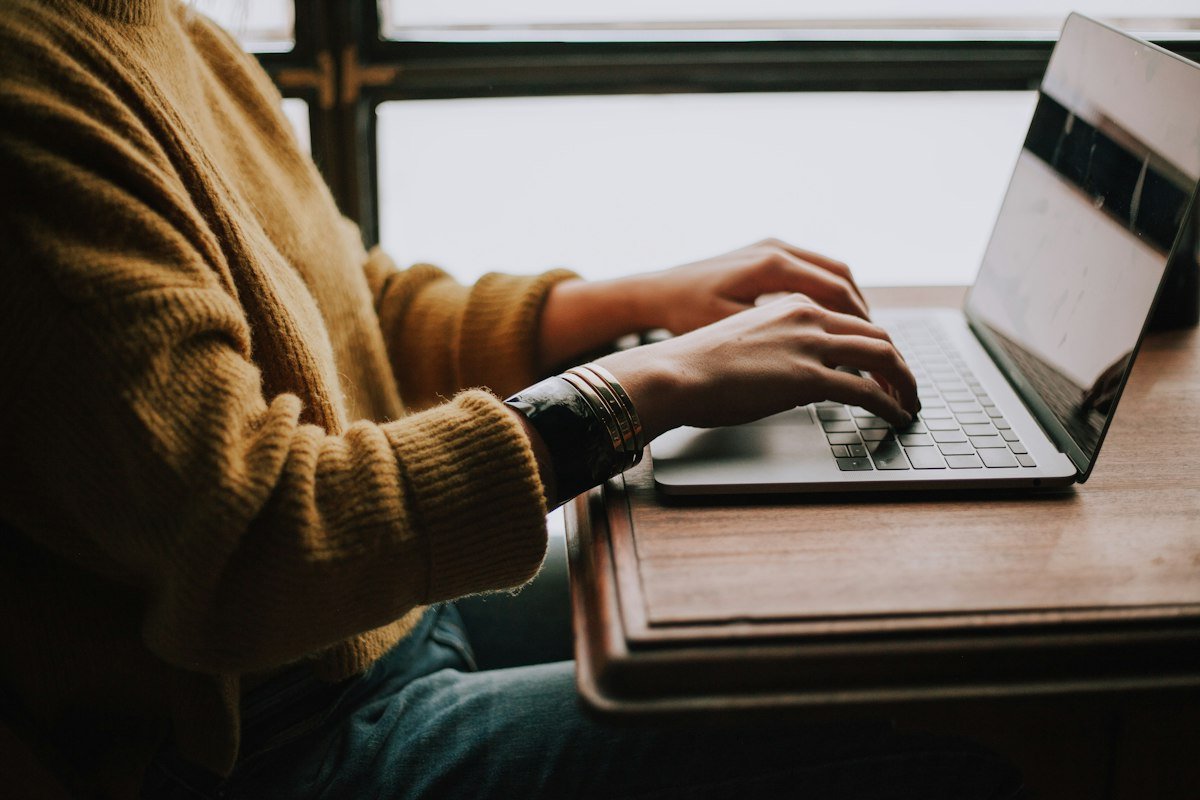 Customer registering online on a laptop